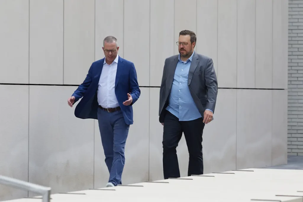 Salt Attorneys Joe Mabe and Paul Havel discussing legal business matters