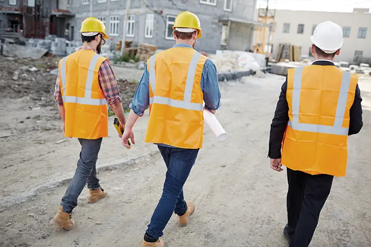 Salt attorney on site visit with multifamily development construction client